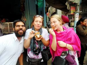 Eating some kind of deliciousness with Sanjay on the food tour.